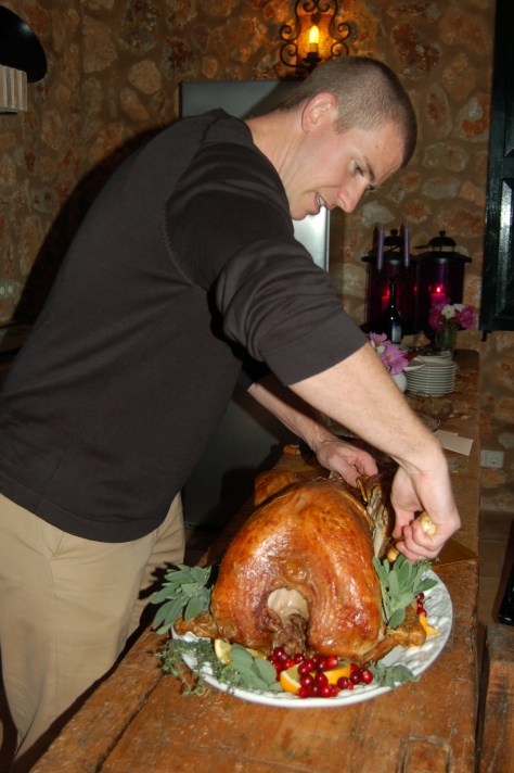 Ross carves one of two golden turkeys. 