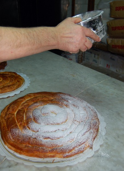Putting the finishing touches to an ensaimada. Photo J Edwards
