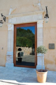 The impressive glass door into Son Brull Hotel and Spa 