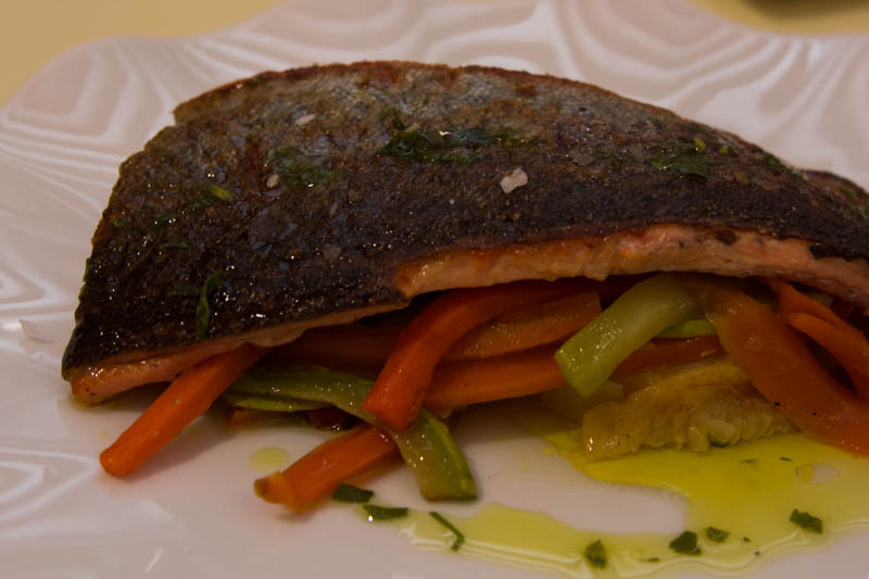 Perfectly cooked fillet of trout with vegetables.