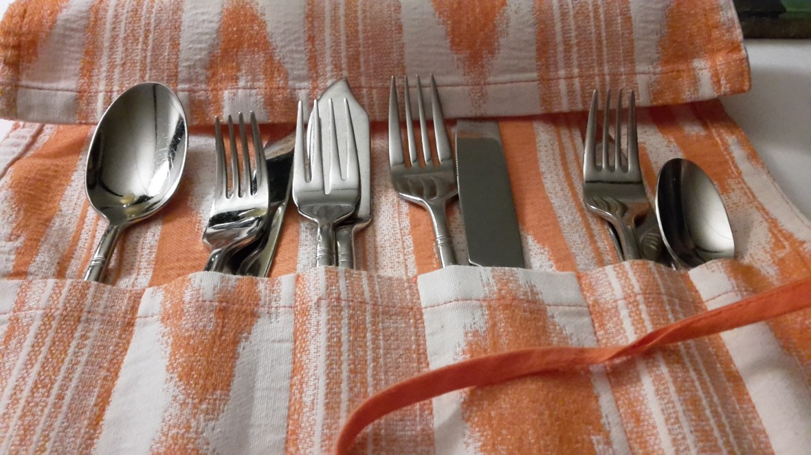 Cutlery presented in a roll