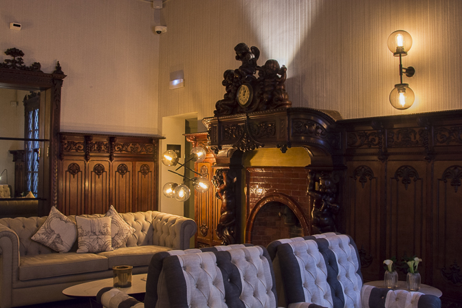 Club room with original fireplace (with built-in clock)