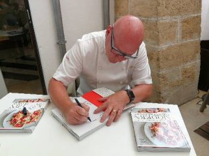 Marc Fosh signing his first cookbook
