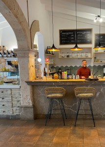 Alessandro behind the counter at Can Kiwi